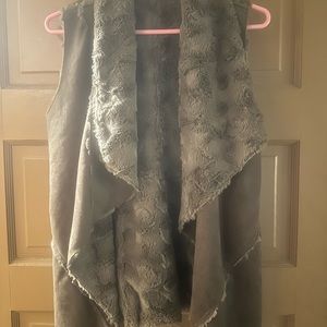 Altered state sleeveless coat